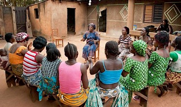 Volunteer Louise Lagni with a women's group in Doutin, Benin; Photo Credit: Johannes Ode